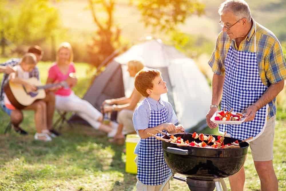 Family BBQ with charcoal bbq grill