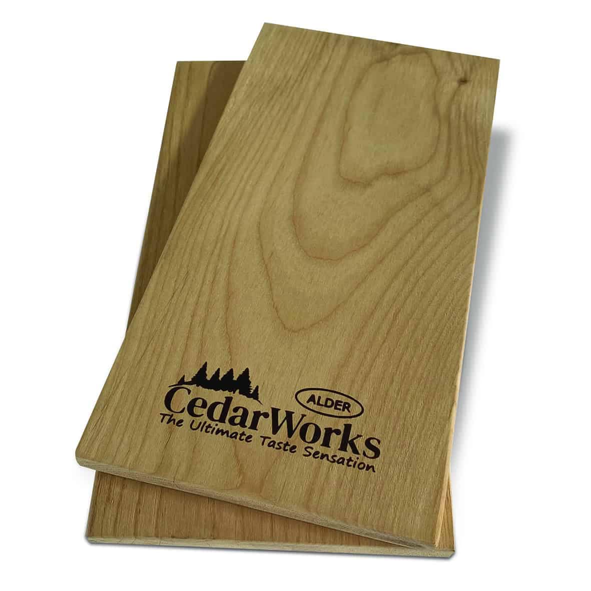 Smooth natural cedar wood boards with Cedar Works logo, ideal for carpentry and woodworking projects, showcasing high-quality craftsmanship and premium cedar timber.