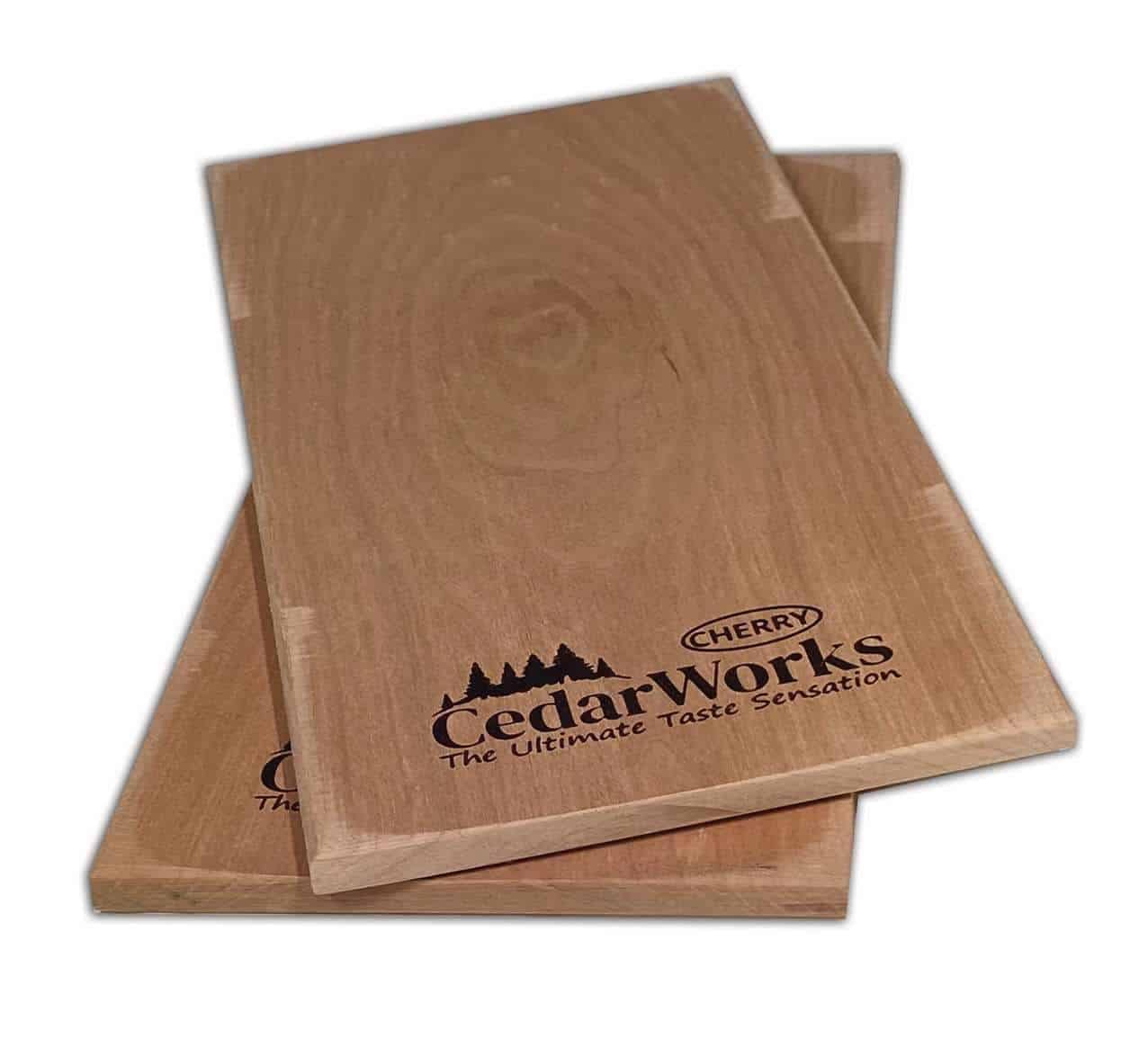 Handcrafted cedar wood coasters with Cherry Cedar Works logo, showcasing natural wood grain and premium quality craftsmanship for home decor and indoor/outdoor use.