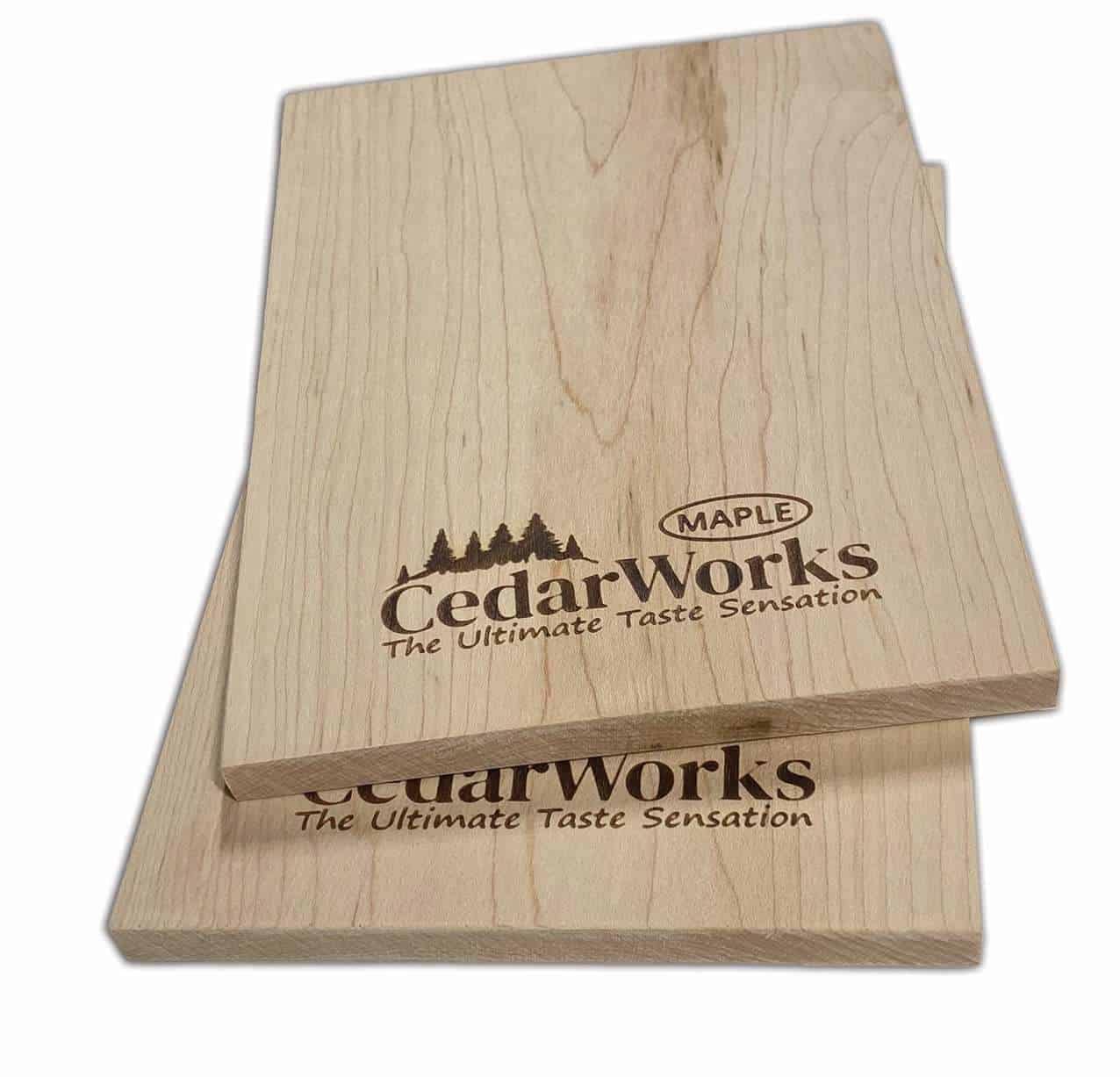 Natural maple wood chopping board with Cedar Works branding, durable and eco-friendly kitchen accessory for food preparation.