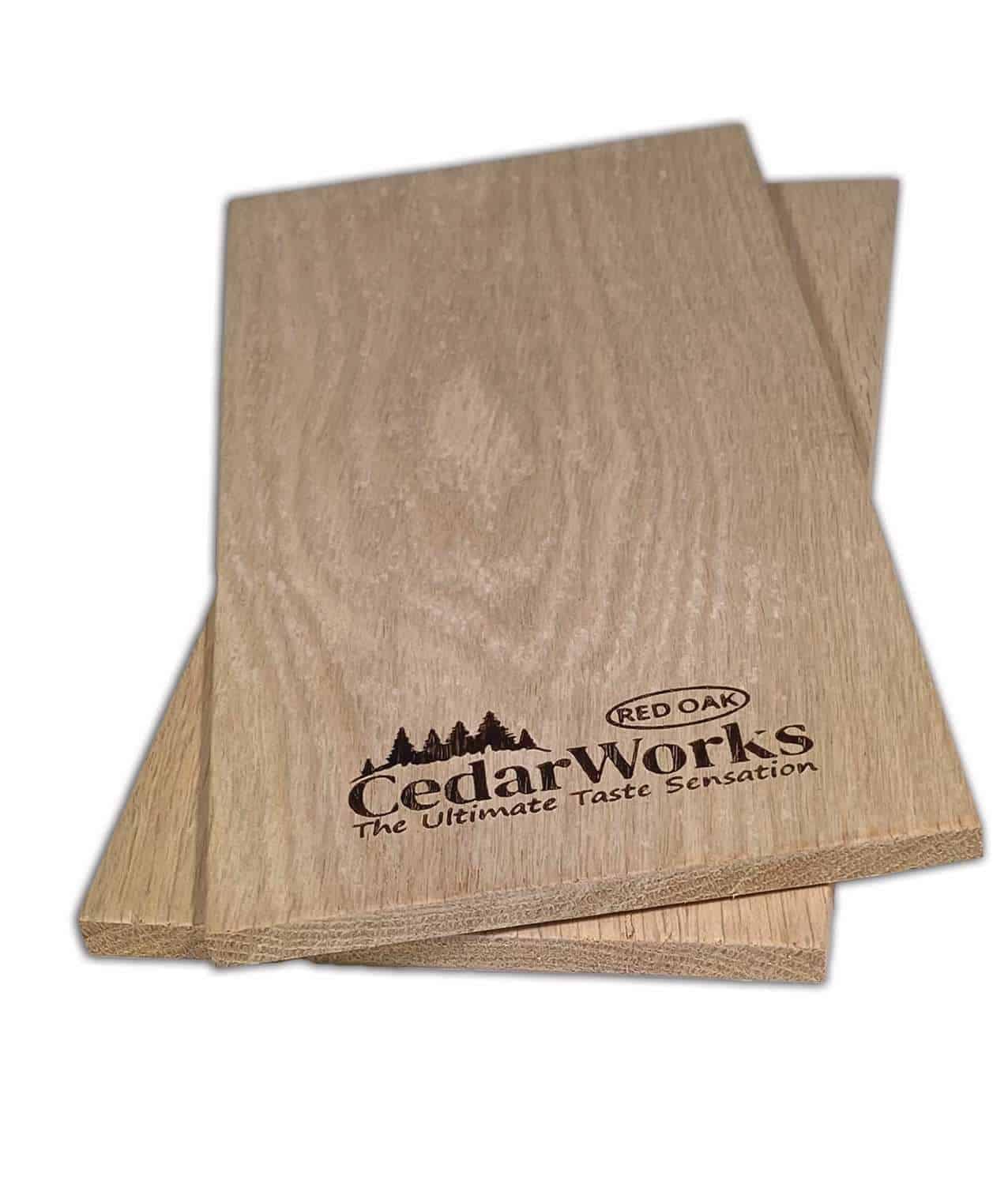 Smooth finished cedar wood sample showing natural grain patterns, branded with Cedar Works logo for premium custom cedar wood products.