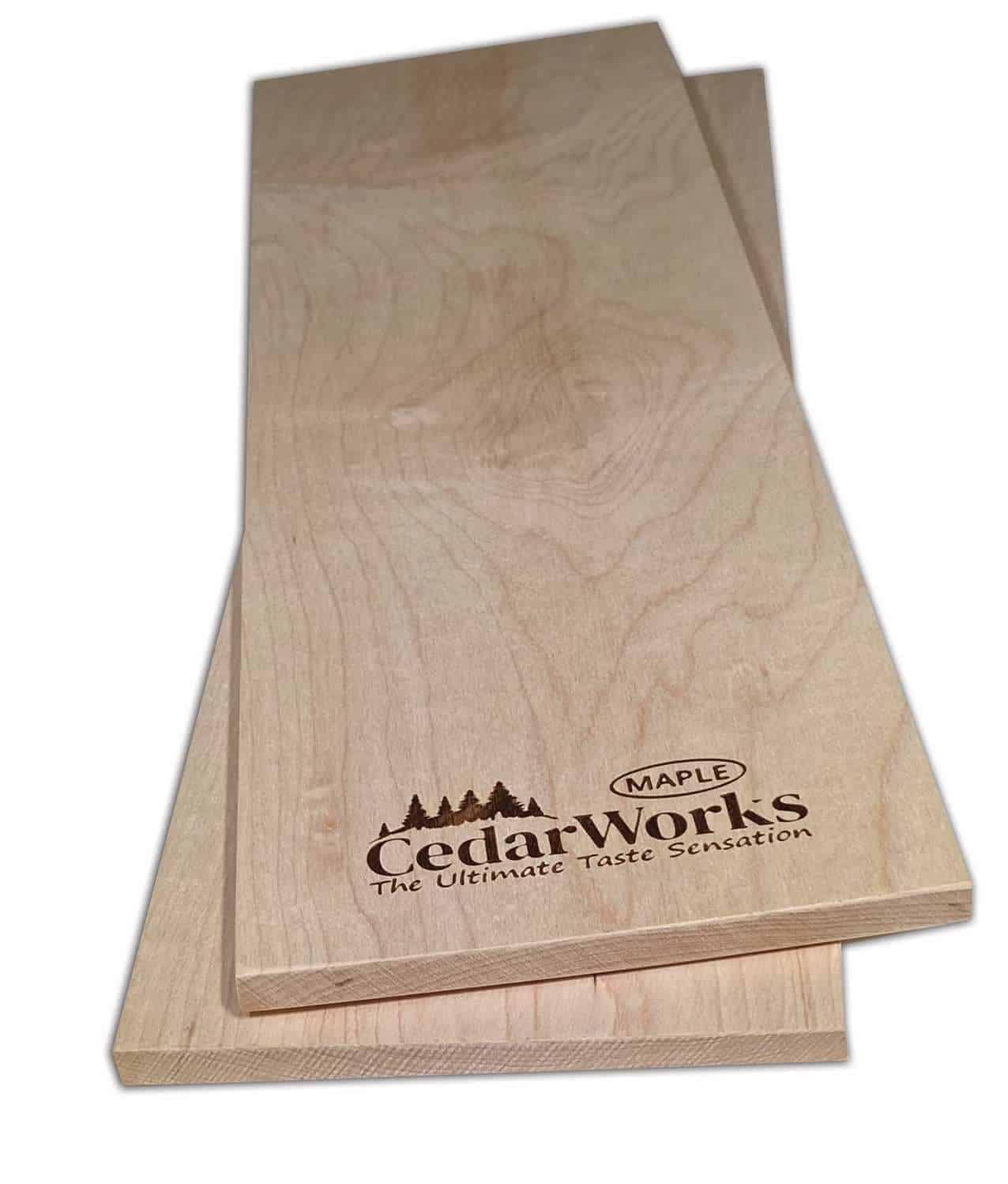 Solid maple wood cutting board with Cedar Works logo and natural wood grain. Perfect for kitchen prep, showcasing craftsmanship in high-quality timber products.