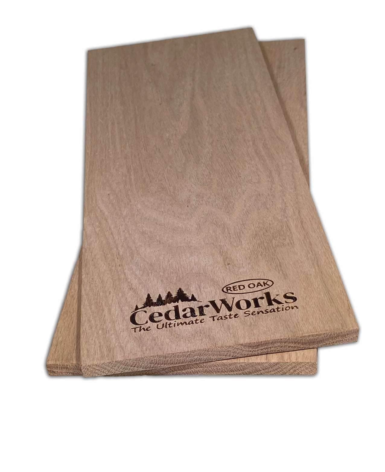 Elegant cedar wood sample with Cedar Works branding and Red Oak label, showcasing high-quality custom woodworking and craftsmanship.