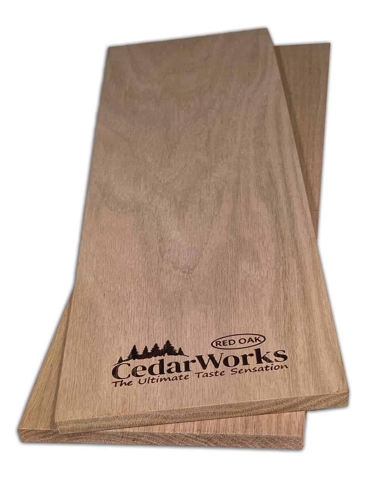 Smooth red oak wood chopping board with Cedar Works logo, ideal for kitchen prep and presentation, showcasing high-quality craftsmanship and durable construction.