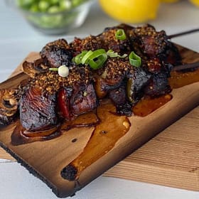 kebabs with spices on grilling plank