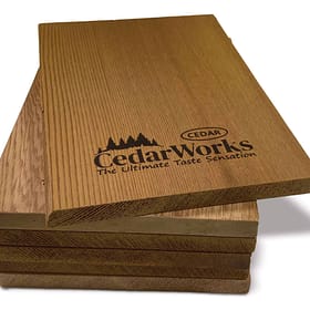 Smooth cedar wood sample with Cedar Works logo and branding for premium quality cedar products.