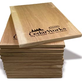 Natural cedar wood coasters branded with Cedar Works logo, perfect for protecting surfaces and adding rustic charm. Ideal for indoor and outdoor use, showcasing high-quality timber craftsmanship.