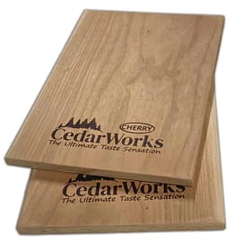 Natural cedar wood cheese boards with Cedar Works logo, ideal for cheese platters and kitchen presentation, showcasing quality craftsmanship and attractive wood grain.
