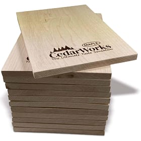 Natural maple cedar wood samples with Cedar Works logo, showcasing high-quality, handcrafted wooden products for taste and aesthetic appeal.
