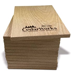 CedarWorks wooden sample tiles with Cedar Works logo, showcasing high-quality craftsmanship and natural wood texture for custom furniture and woodworking projects.