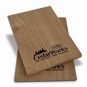 Sustainable cedar wood coasters with Cedar Works logo, perfect for home, office, or commercial use, showcasing craftsmanship and natural beauty.