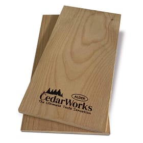 Smooth natural cedar wood chopping board with Cedar Works logo, ideal for kitchen use and food preparation, showcasing high-quality timber craftsmanship.