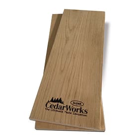 Smooth cedar wood cutting board with Cedar Works logo, perfect for kitchen prep and outdoor barbeques, showcasing quality craftsmanship and natural timber appeal.