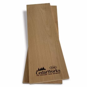 Smooth cedar wood chopping board with CedarWorks Alder logo embossed, ideal for kitchen prep and serving, showcasing quality craftsmanship and natural wood finish.