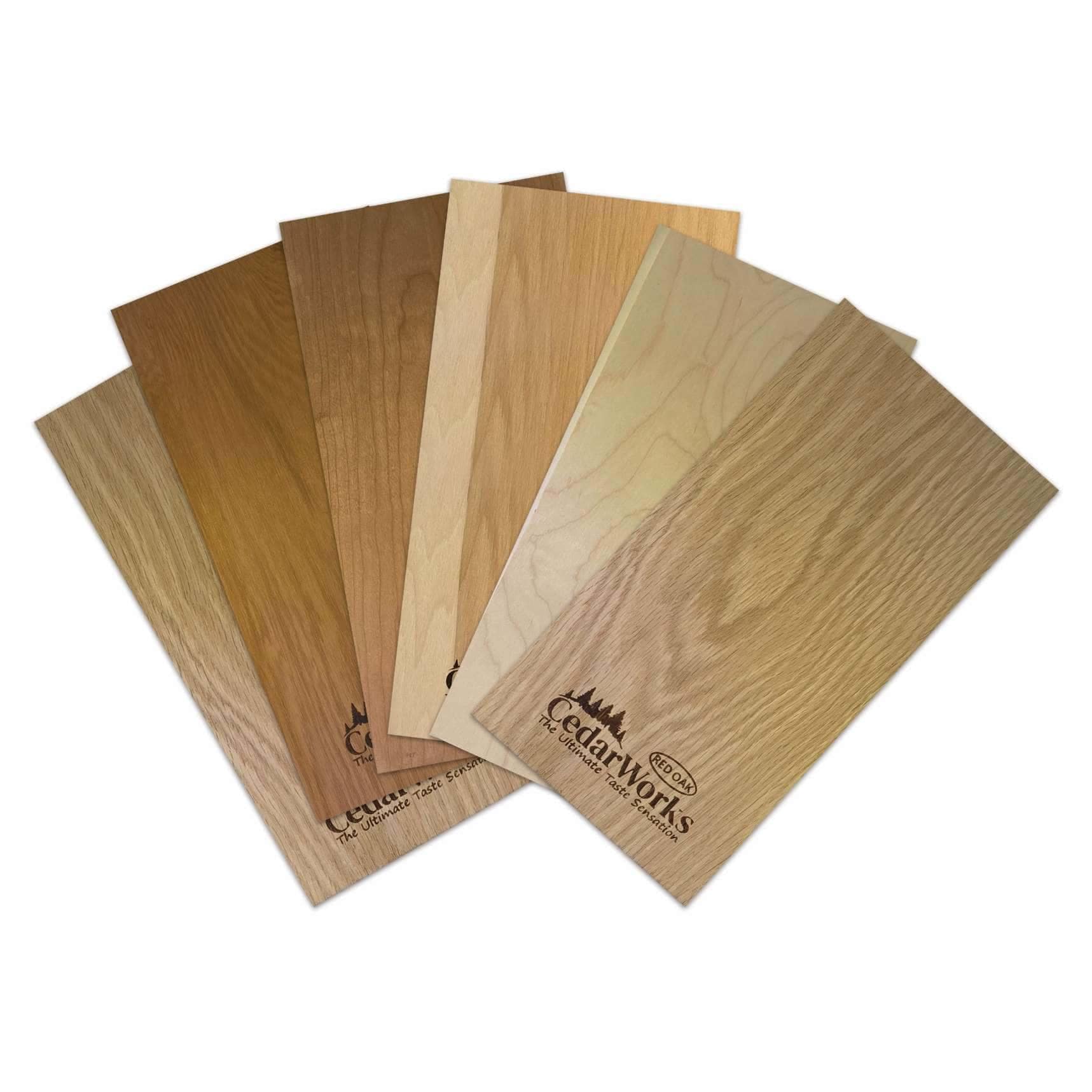 Natural cedar wood samples showcasing the variety of finishes and grains for custom woodworking projects. Perfect for decking, fencing, and interior timber applications.