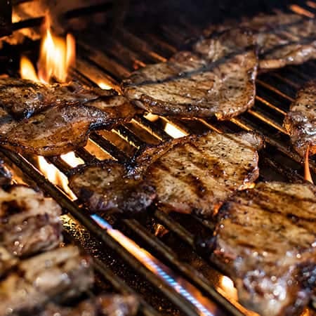 BBQ grilling steak with gas fuel